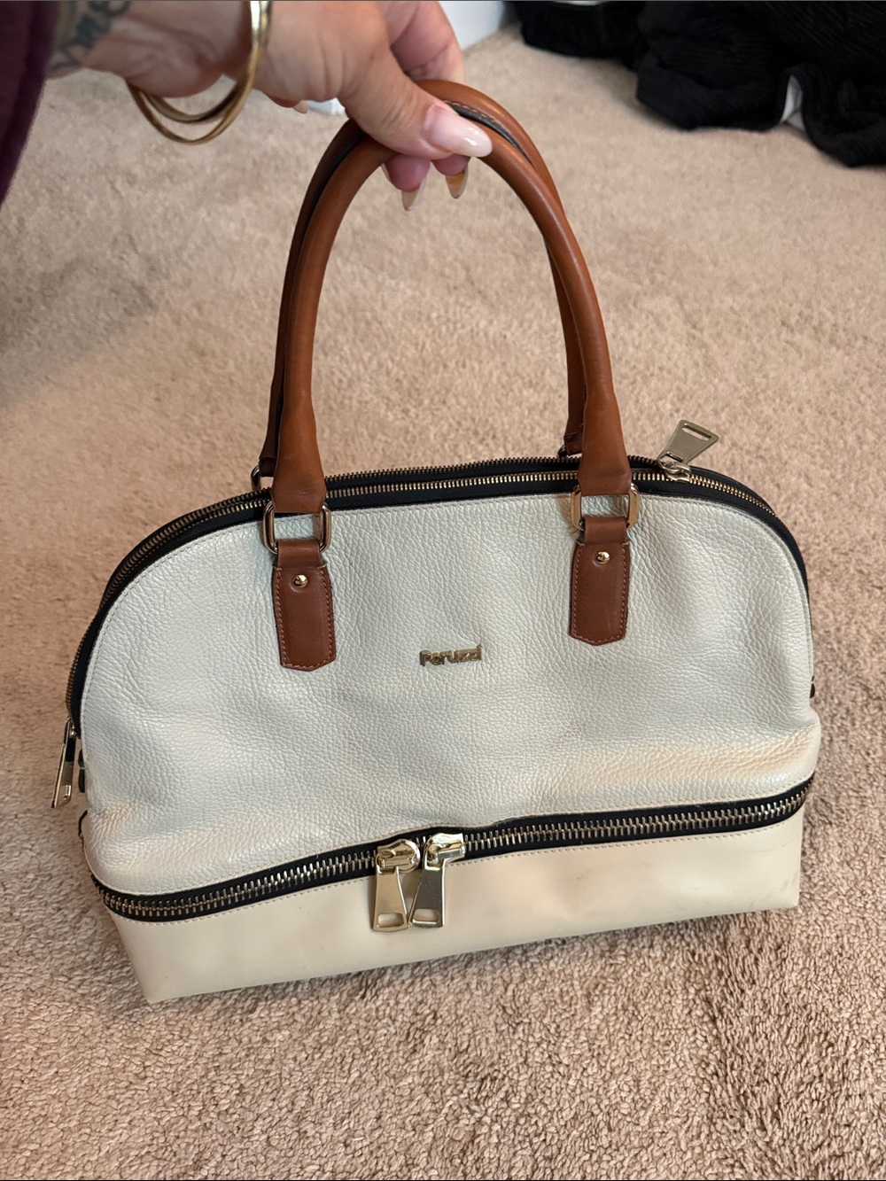 PeruzI Italian leather handbag cream color w brown handles